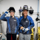 Conrad (left) and Hall geared up to do some welding.